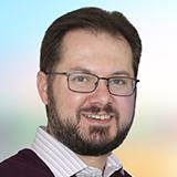 portrait image of aaron karp