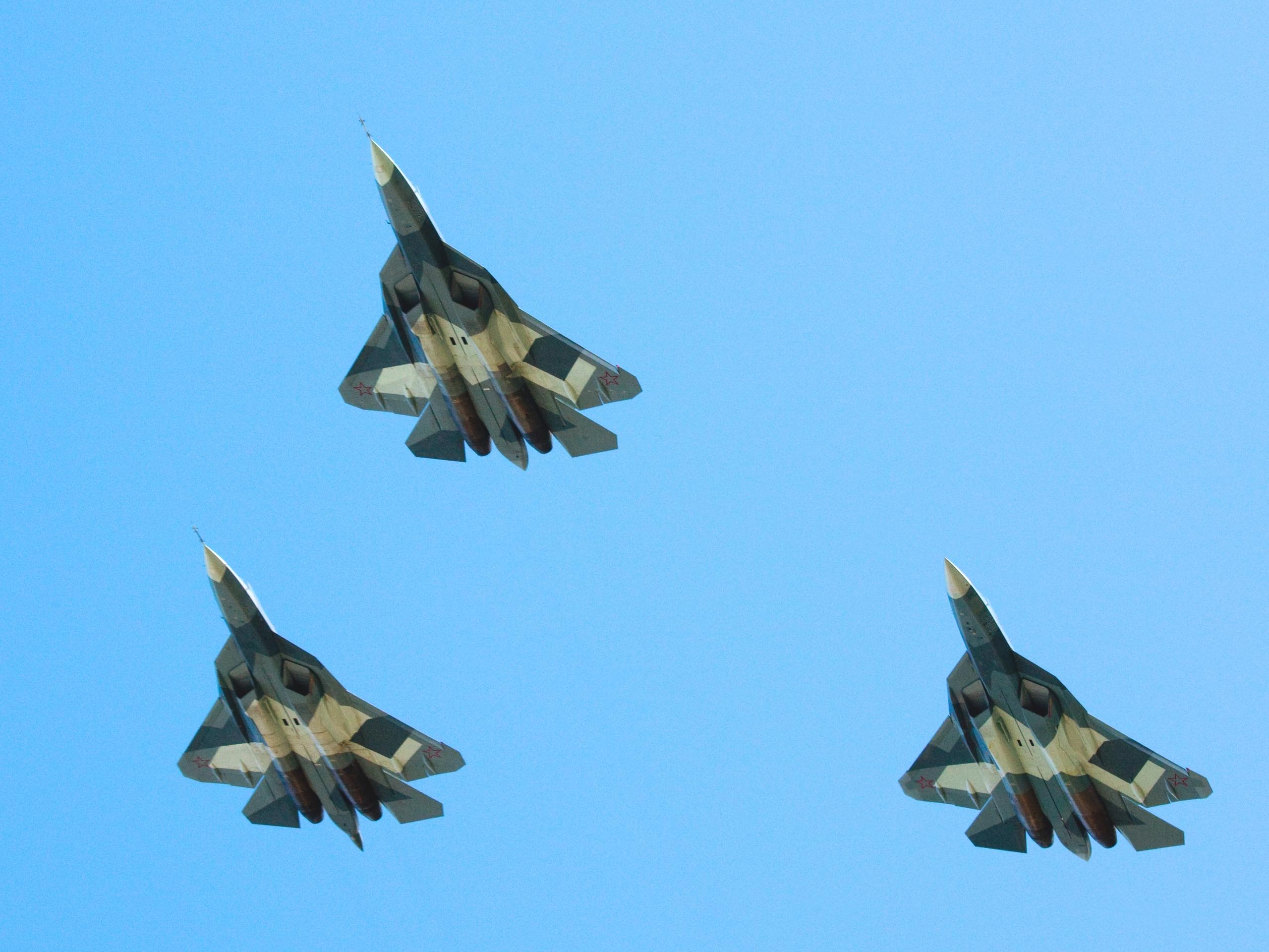 Su-57s in flight