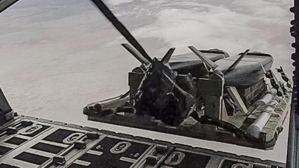 palletized munitions exiting aircraft