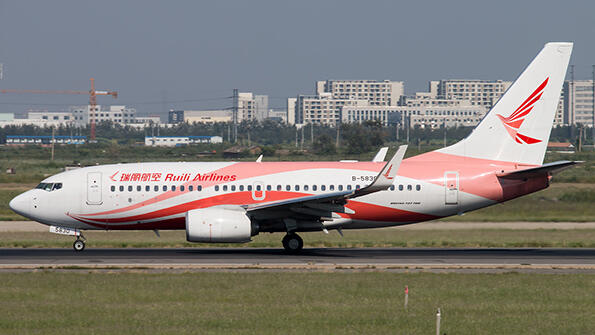 Ruili Airines aircraft on runway