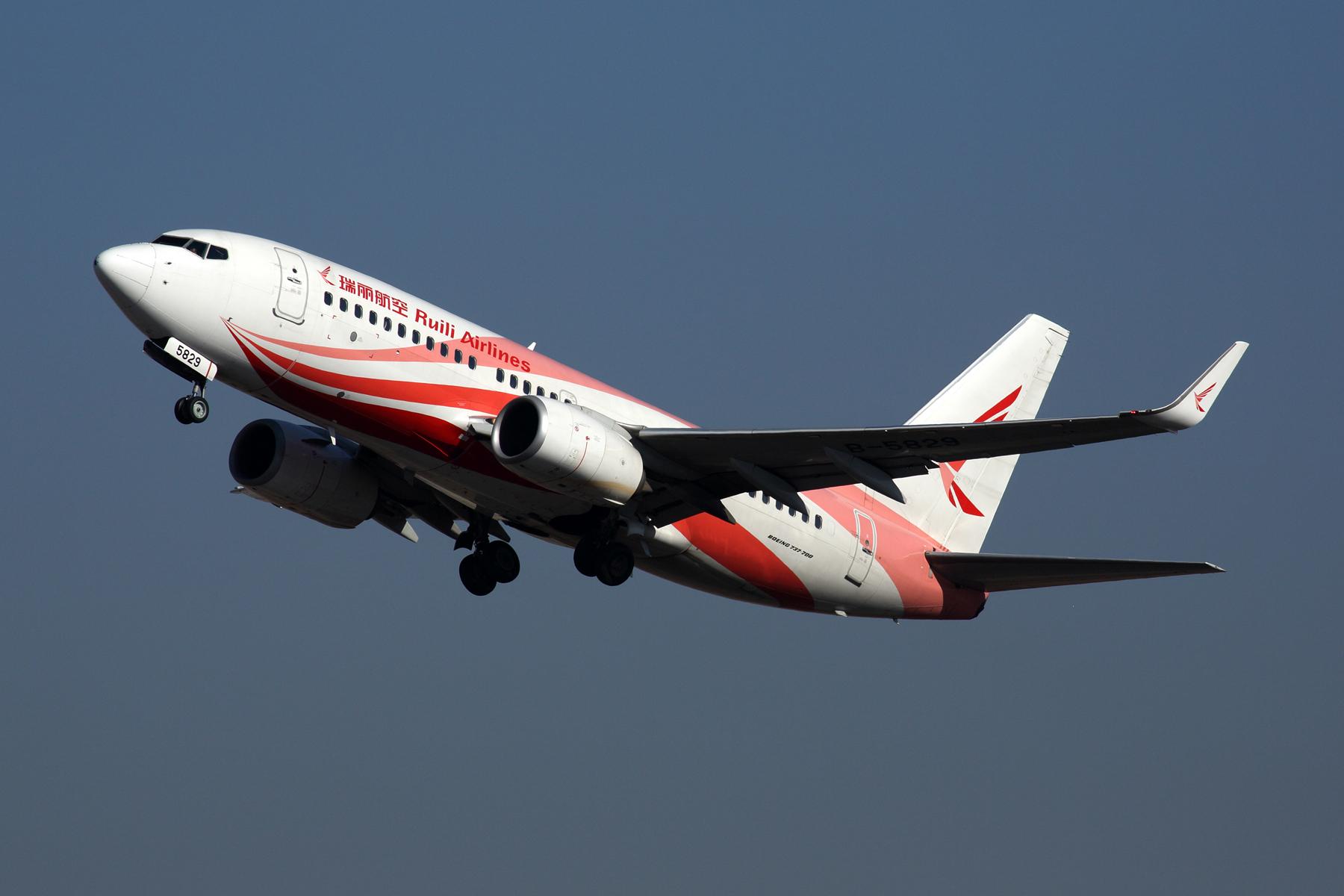 Ruili Airlines 737-700 taking off