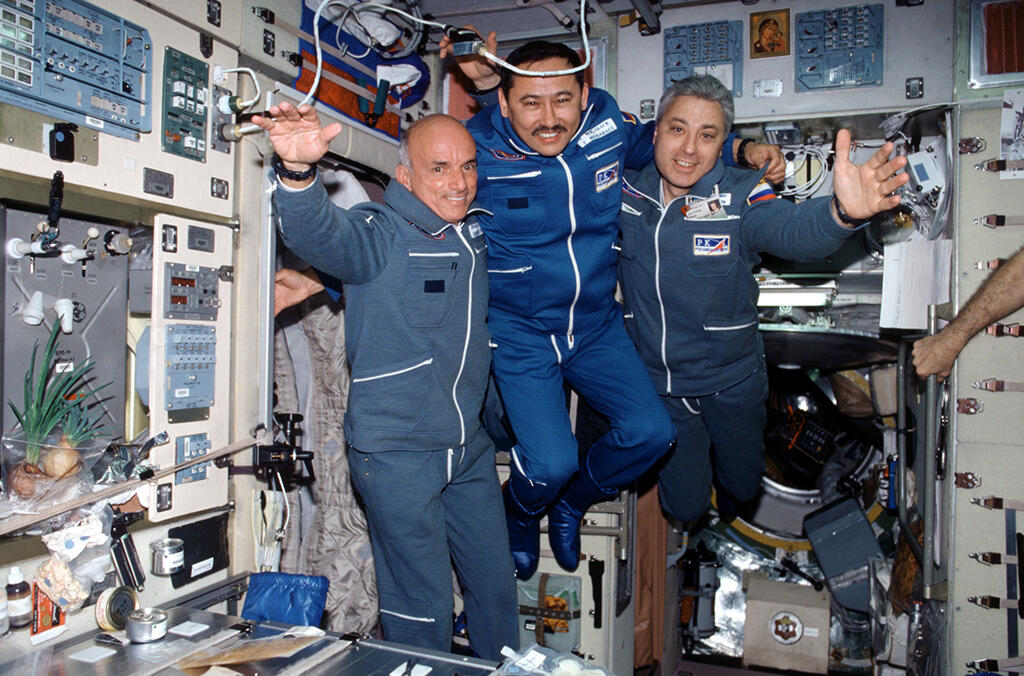 aerospace crew with first private space tourist Dennis Tito