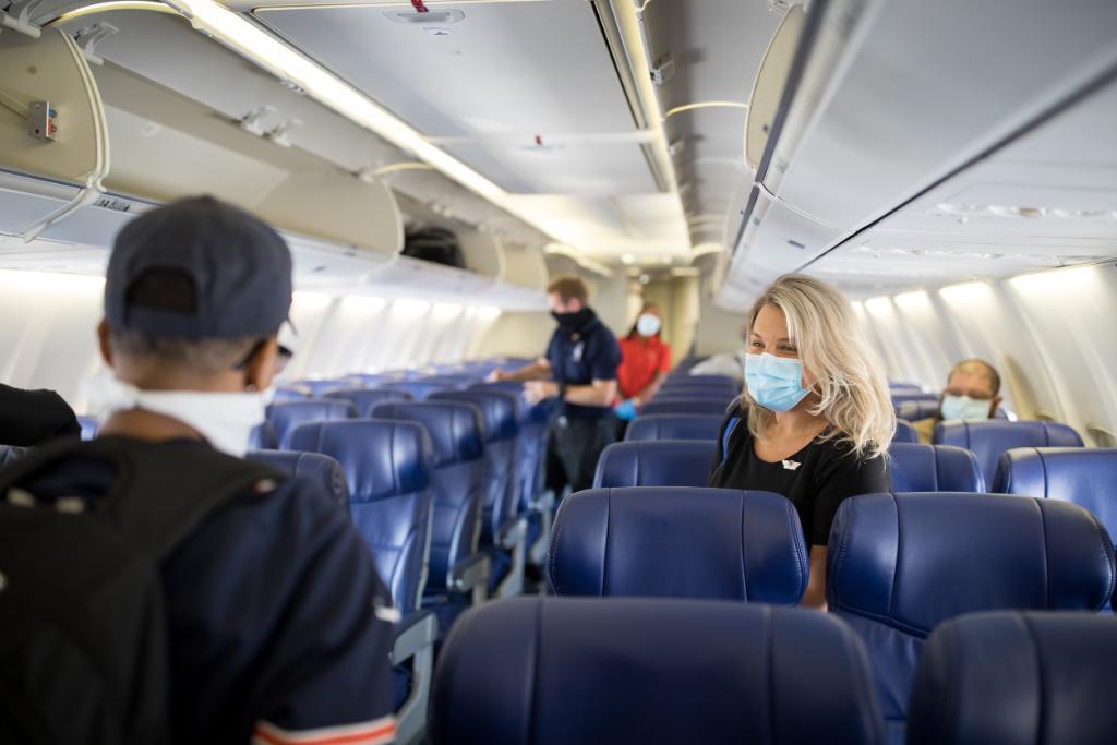 Southwest Airlines flight attendant and passengers