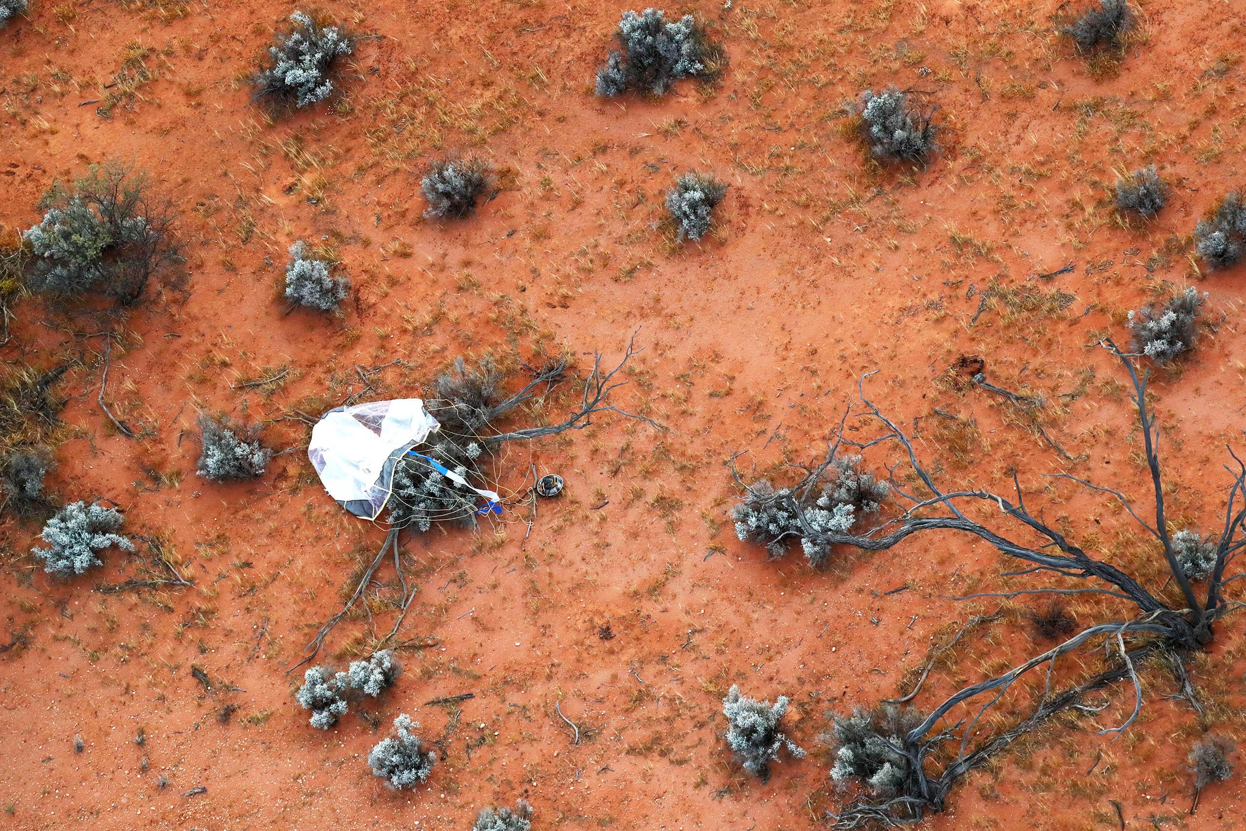 Hayabusa 2 sample container on the ground.