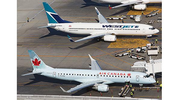 WestJet and Air Canada aircraft on tarmac