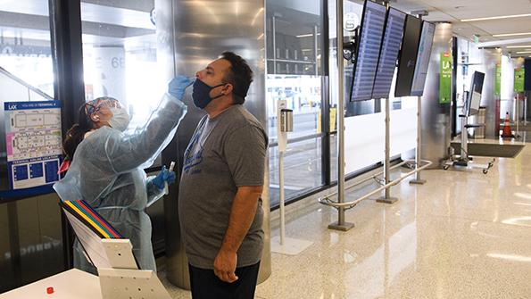 COVID-19 passenger screening at airport