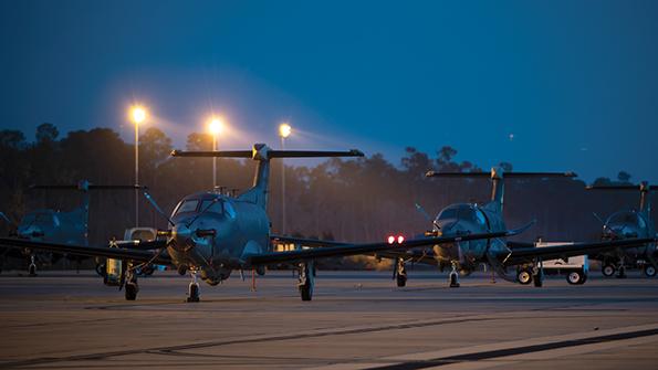 light attack aircraft on runway