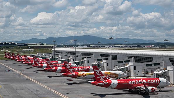 parked AirAsia Malaysian aircraft 