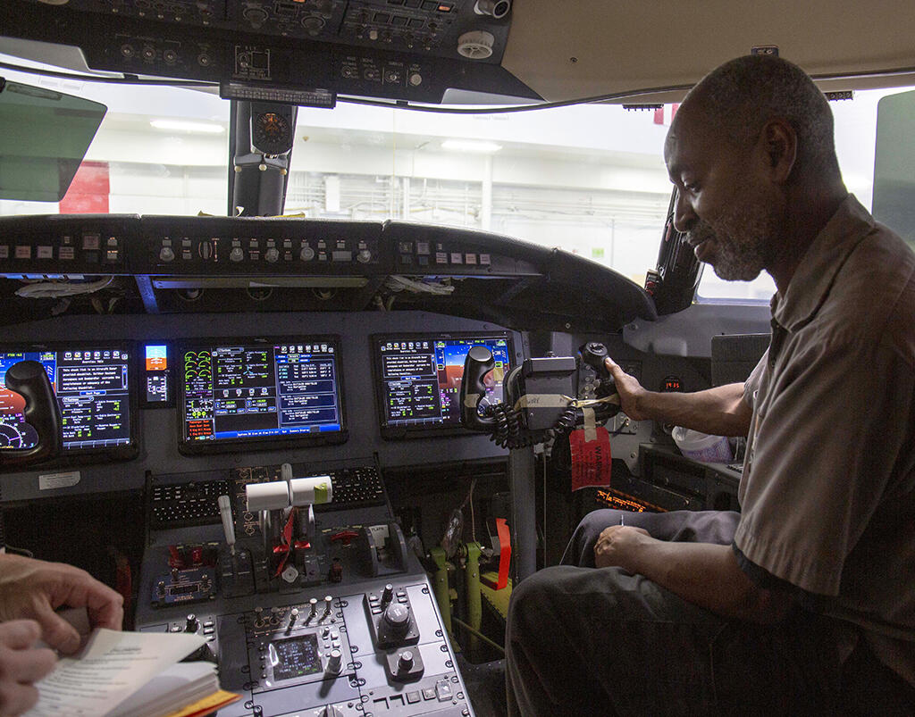 Constant Aviation technician installs a Collins Pro Line Fusion in a Bombardier Challenger 604