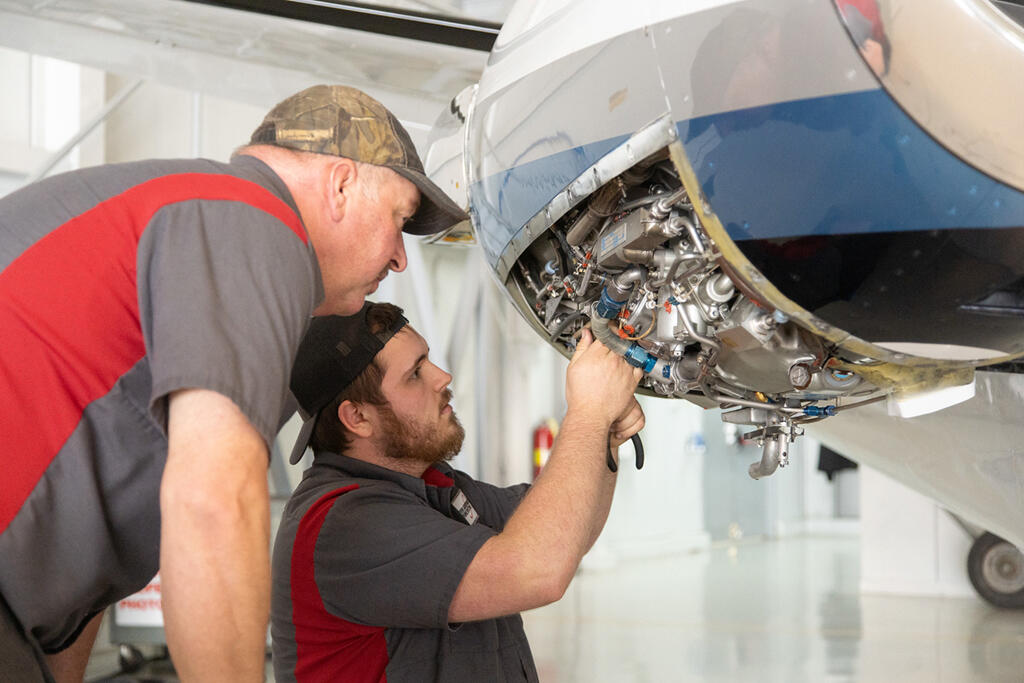 Stevens Aerospace technicians performing routine maintenance