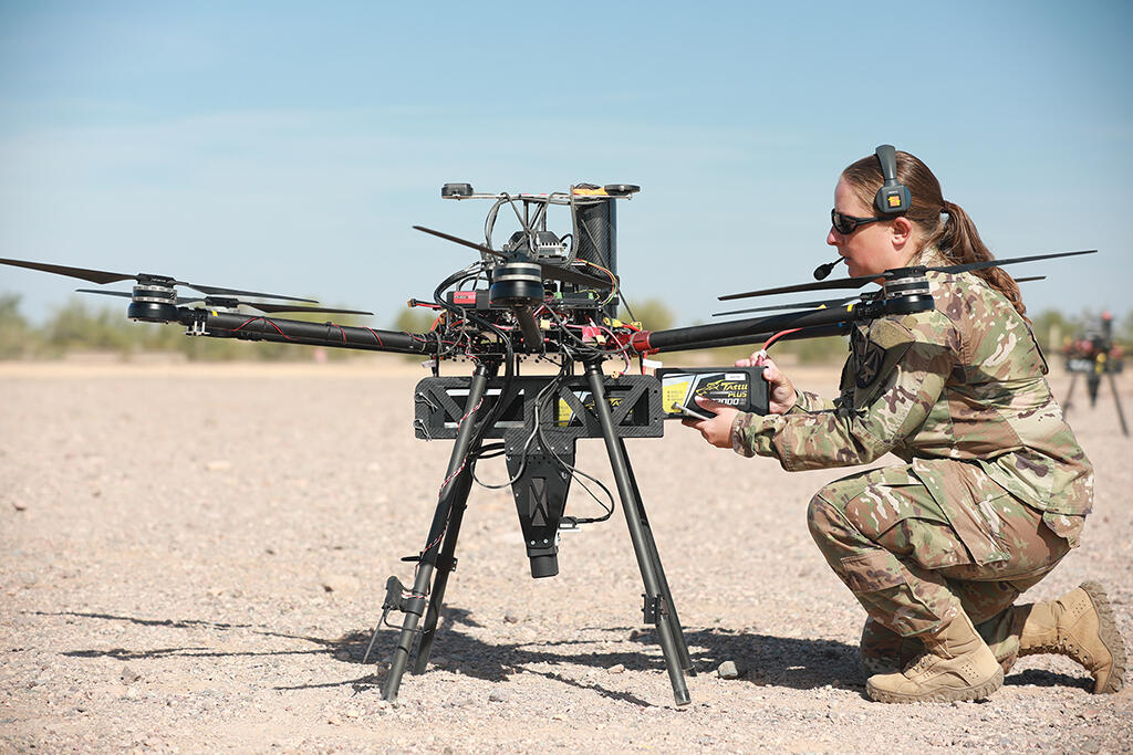 soldier working on unmanned aerial system