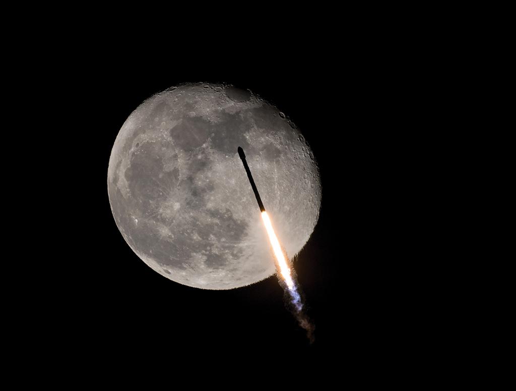 SpaceX Falcon 9 rocket passes in front of the Moon