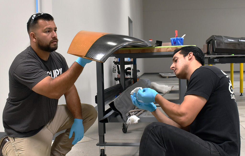 Overair technicians Danny Silva and Andrew Iniguez
