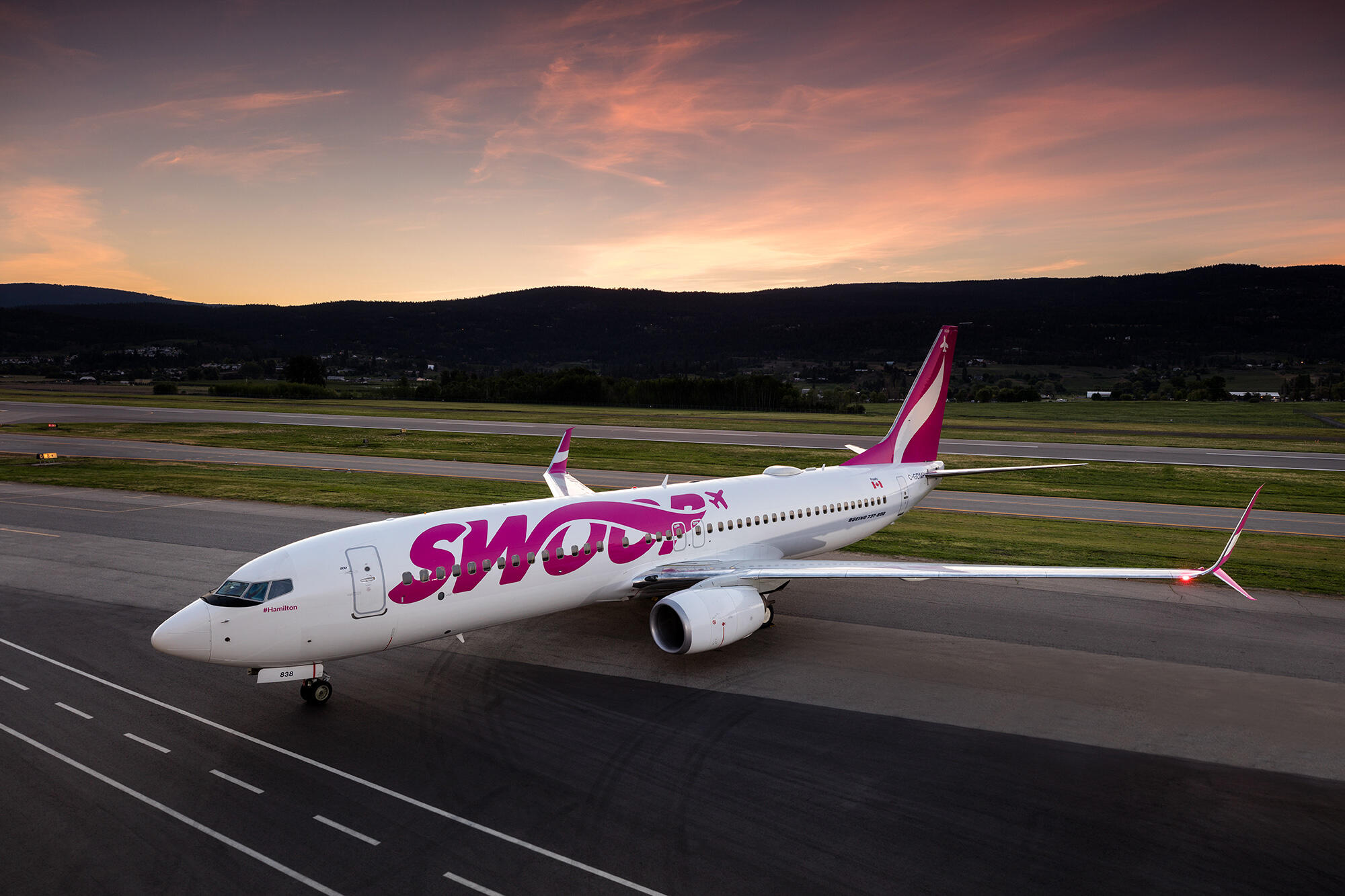 Swoop 737 on runway