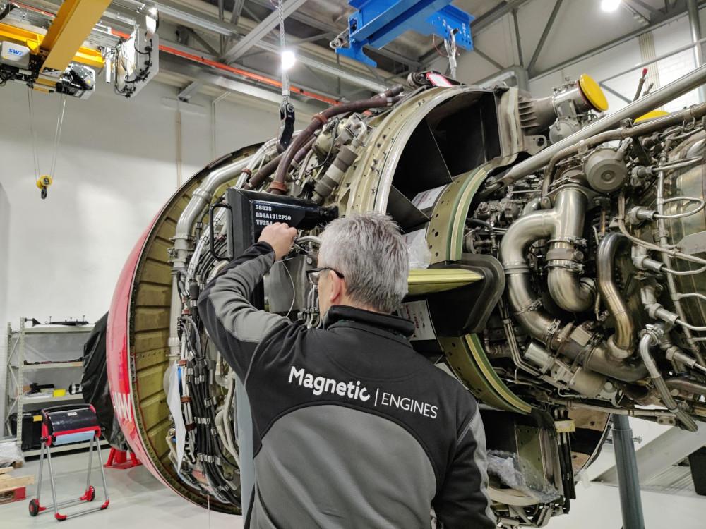 Magnetic MRO technician performing module maintenance on CFM56-7B