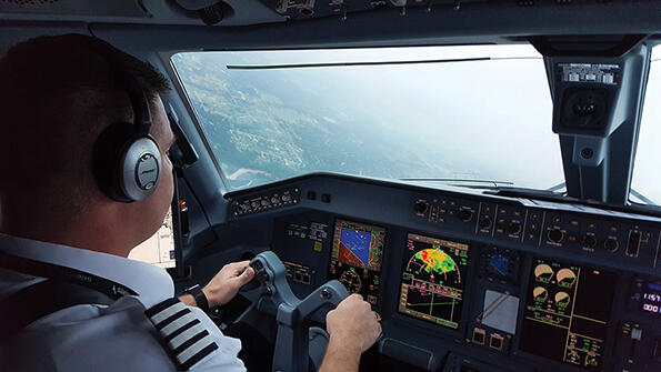 Pilot in cockpit