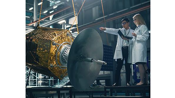 space technicians at work