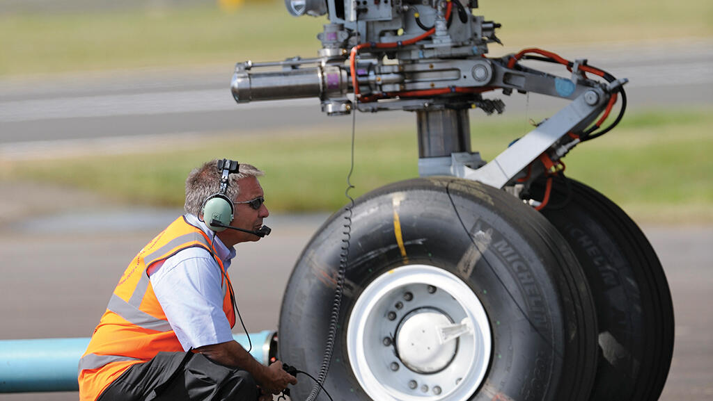 technician at landing gear 