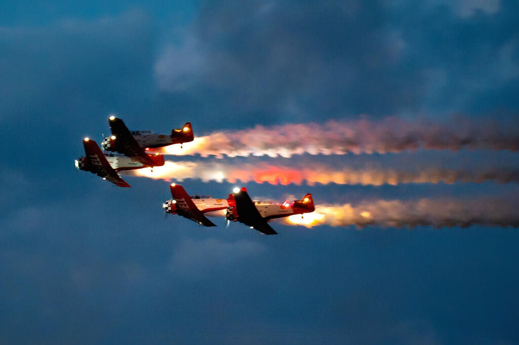 Aeroshell Aerobatic Team flying the North American AT-6 Texan “The Pilot Maker”