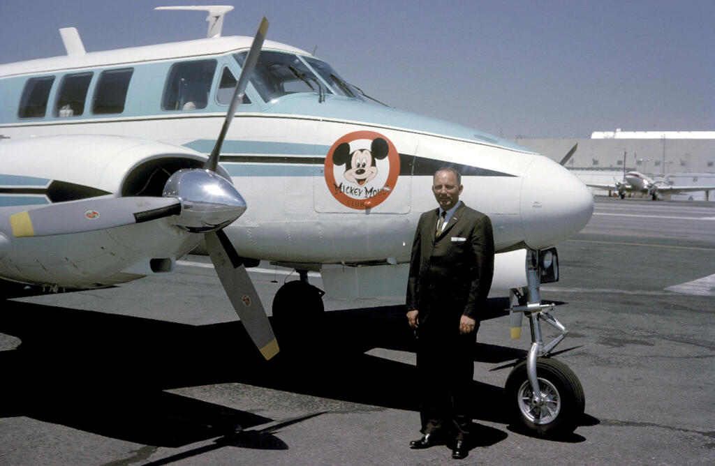 Charles A Malone, Walt’s personal pilot, with Queen Air 65