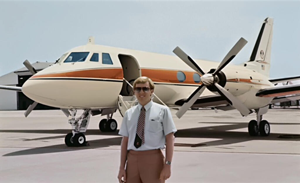 Mark Malone, captain of 234 Mickey Mouse