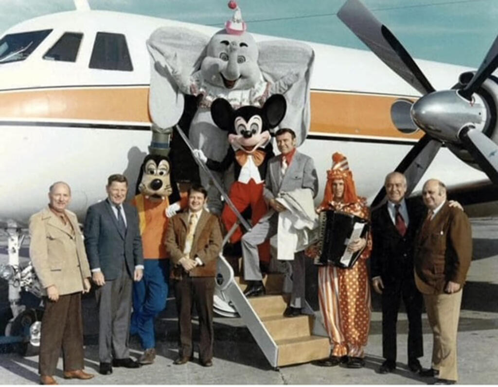 Chuck Malone, Kelvin Bailey and Dumbo tour group