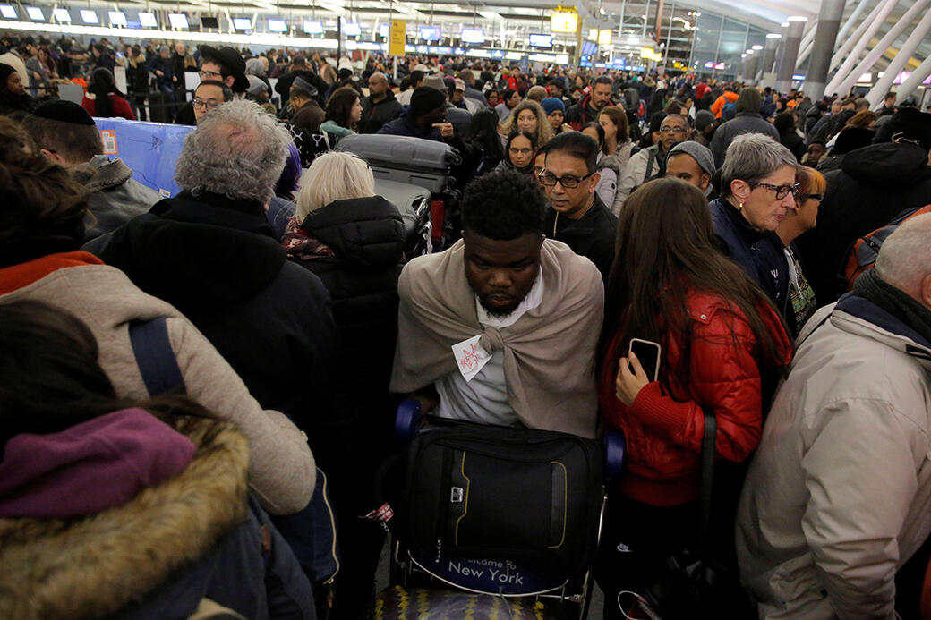 JFK Airport passenger crowd