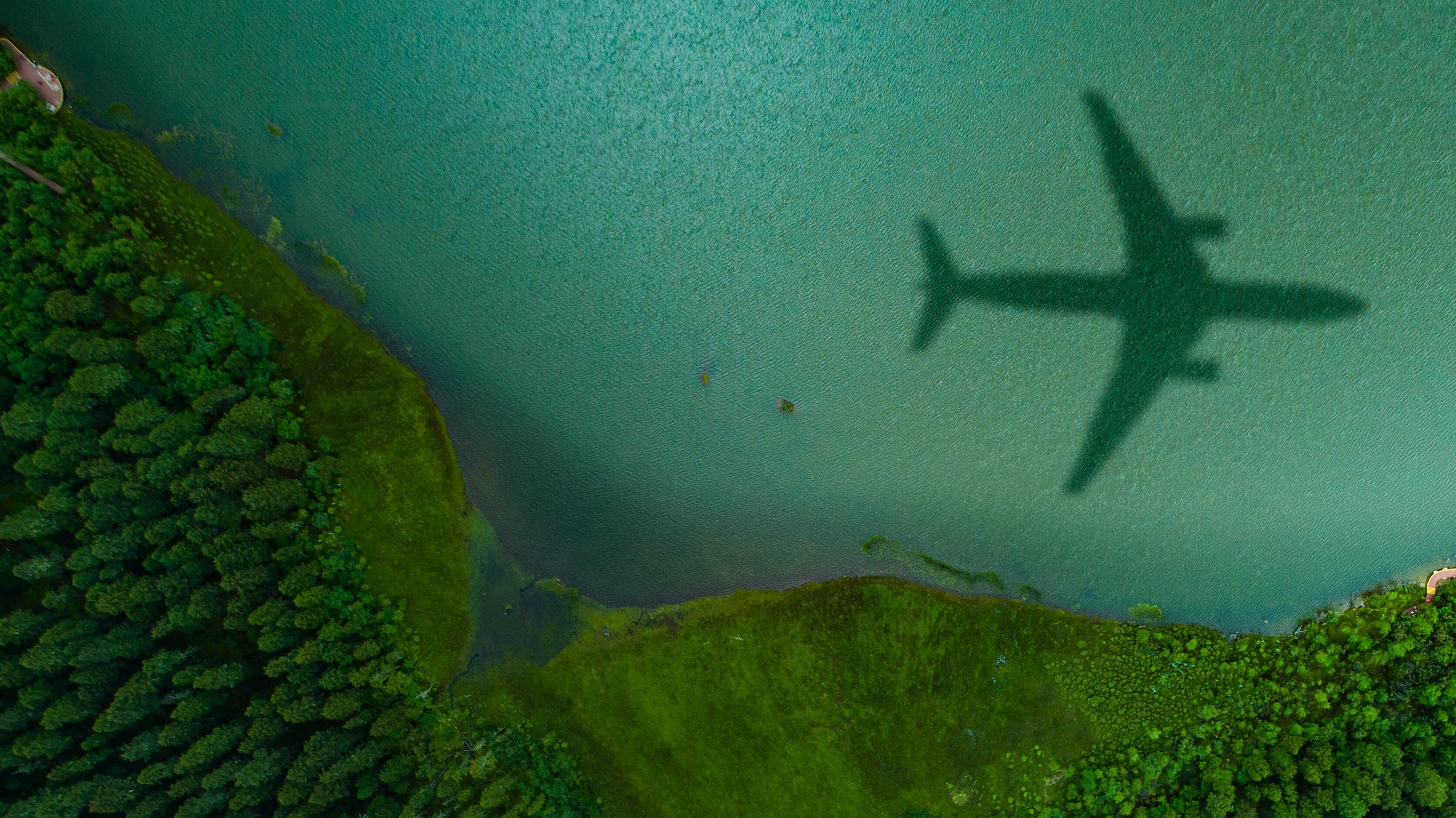 plane shadow over water