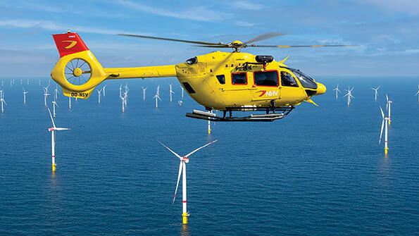 NHV helicopter over wind farm
