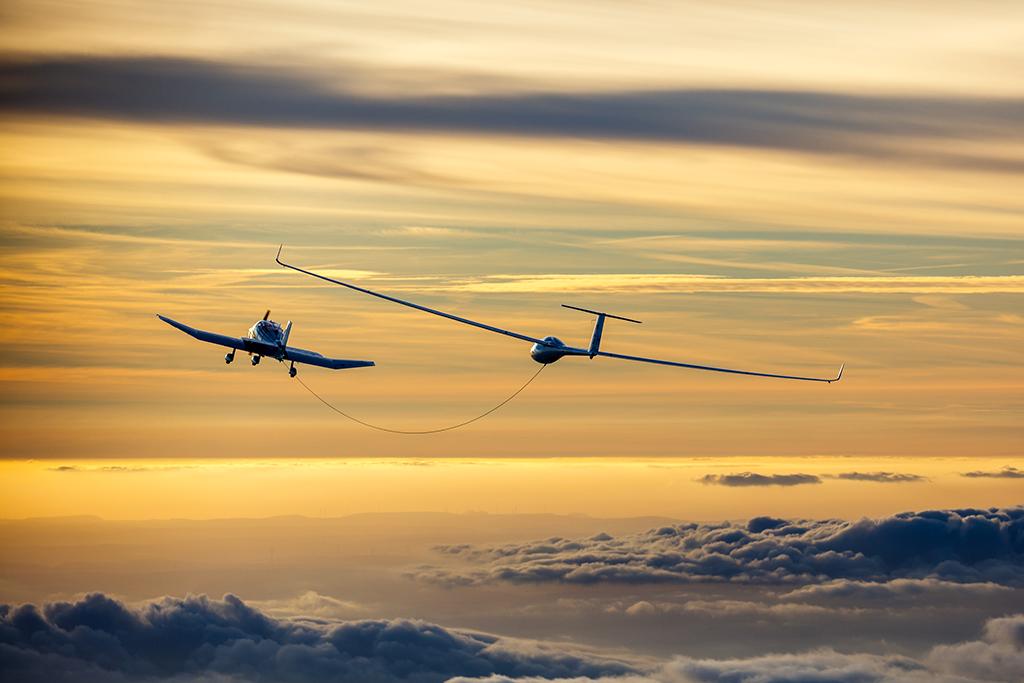 towplane against the low cloud cover