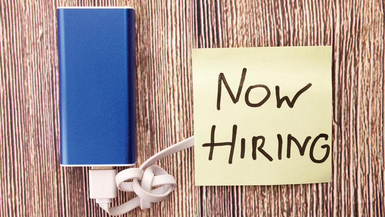 USB battery charger with Now Hiring note