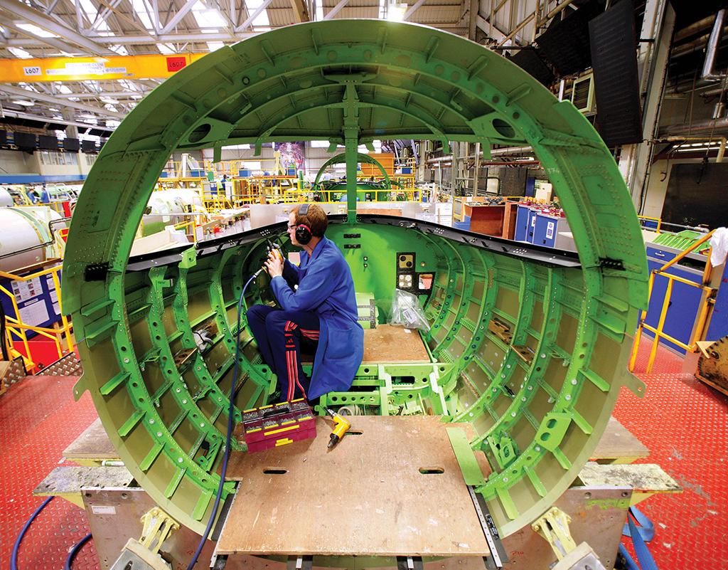 technician working on a fuselage
