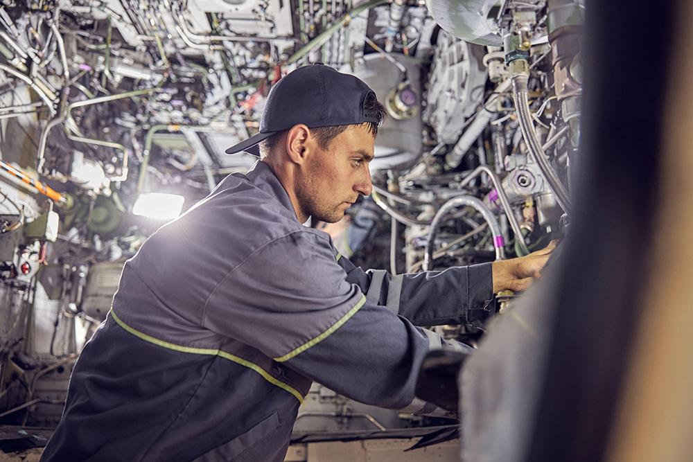 Aircraft mechanic in fuselage