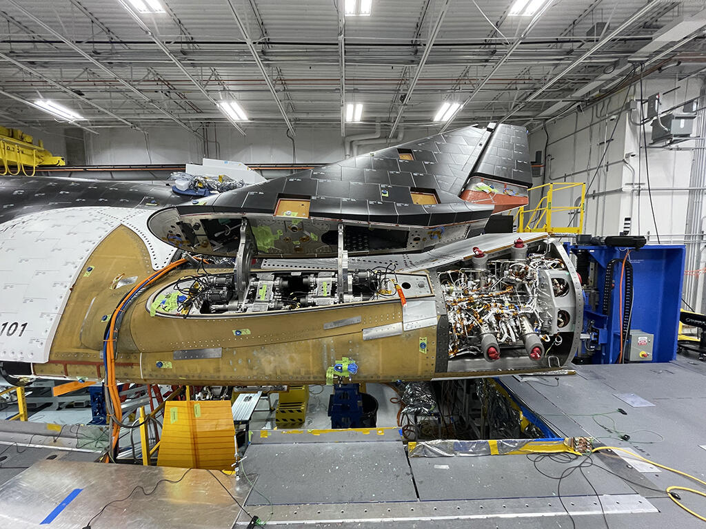 Sierra Space Dream Chaser spaceplane wing fold mechanism and adjacent thruster assembly