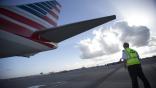 American Airlines pilot checking aircraft tail