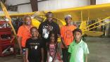 group touring local aircraft hangars