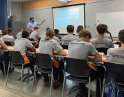 high school students studying aviation