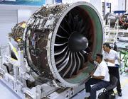 aircraft technicians working on GTF engine