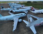 row of parked aircraft